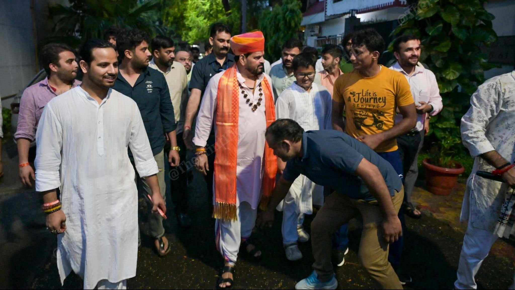 Brij Bhushan Sharan Singh was welcomed by his supporters after getting relief from a Delhi court, in Noida, Uttar Pradesh | Photo: Suraj Singh Bisht | ThePrint