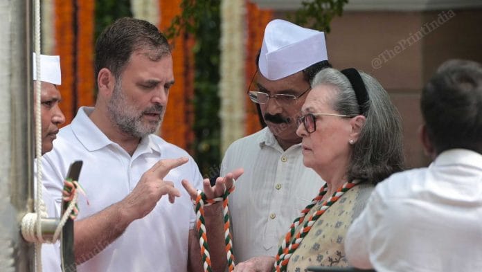 Leader of Opposition Rahul Gandhi and Sonia Gandhi, along with other senior party members, hoisted the tricolour at the Congress party office on the occasion of 80th Independence Day. | Suraj Singh Bisht/ThePrint