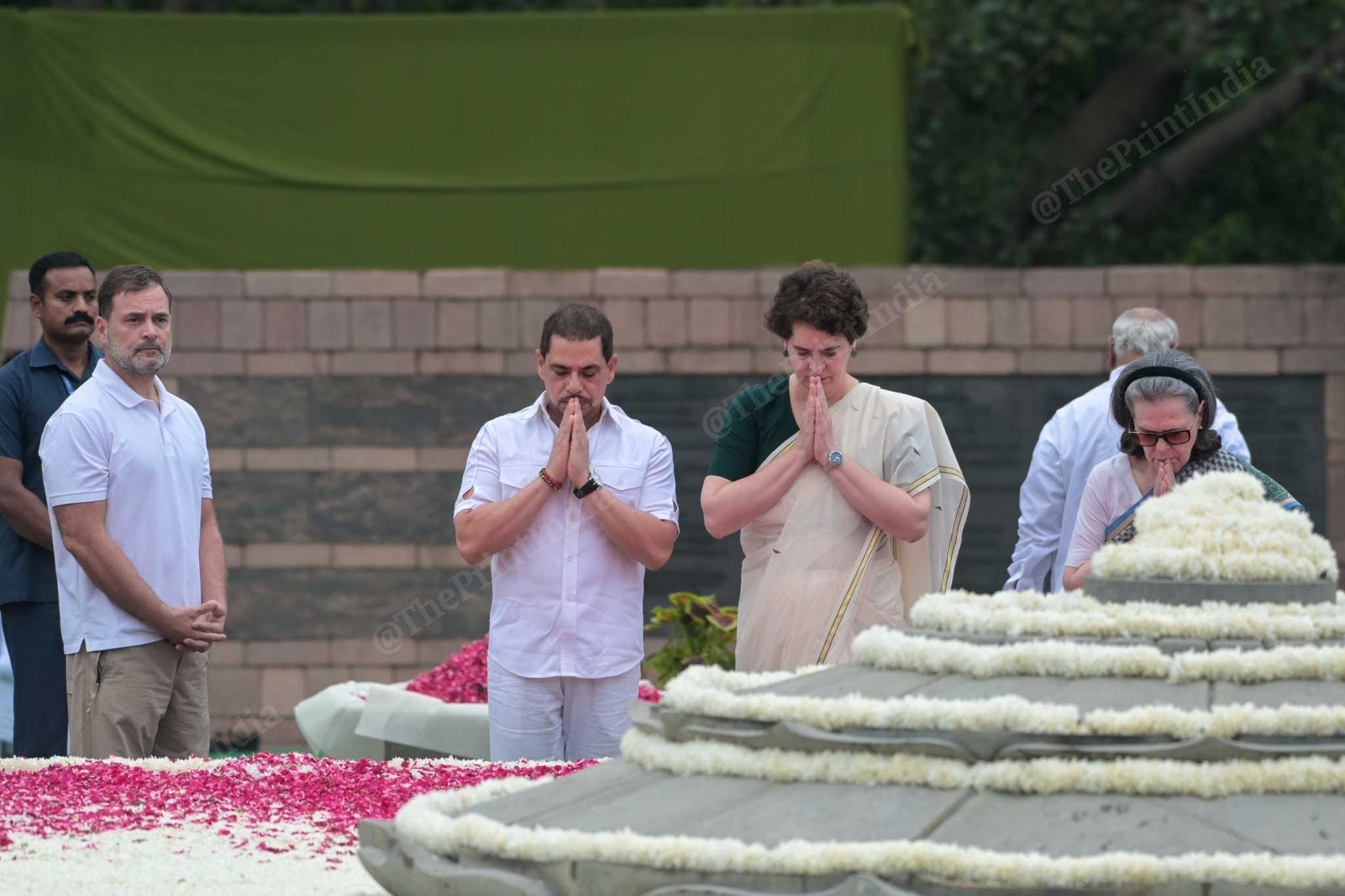 Congress President Mallikarjun Kharge, Sonia Gandhi, Rahul Gandhi, Priyanka Gandhi and other senior leaders pay tributes to former Prime Minister Rajiv Gandhi on his 82nd birth anniversary at Vir Bhumi. | Suraj Singh Bisht/ThePrint