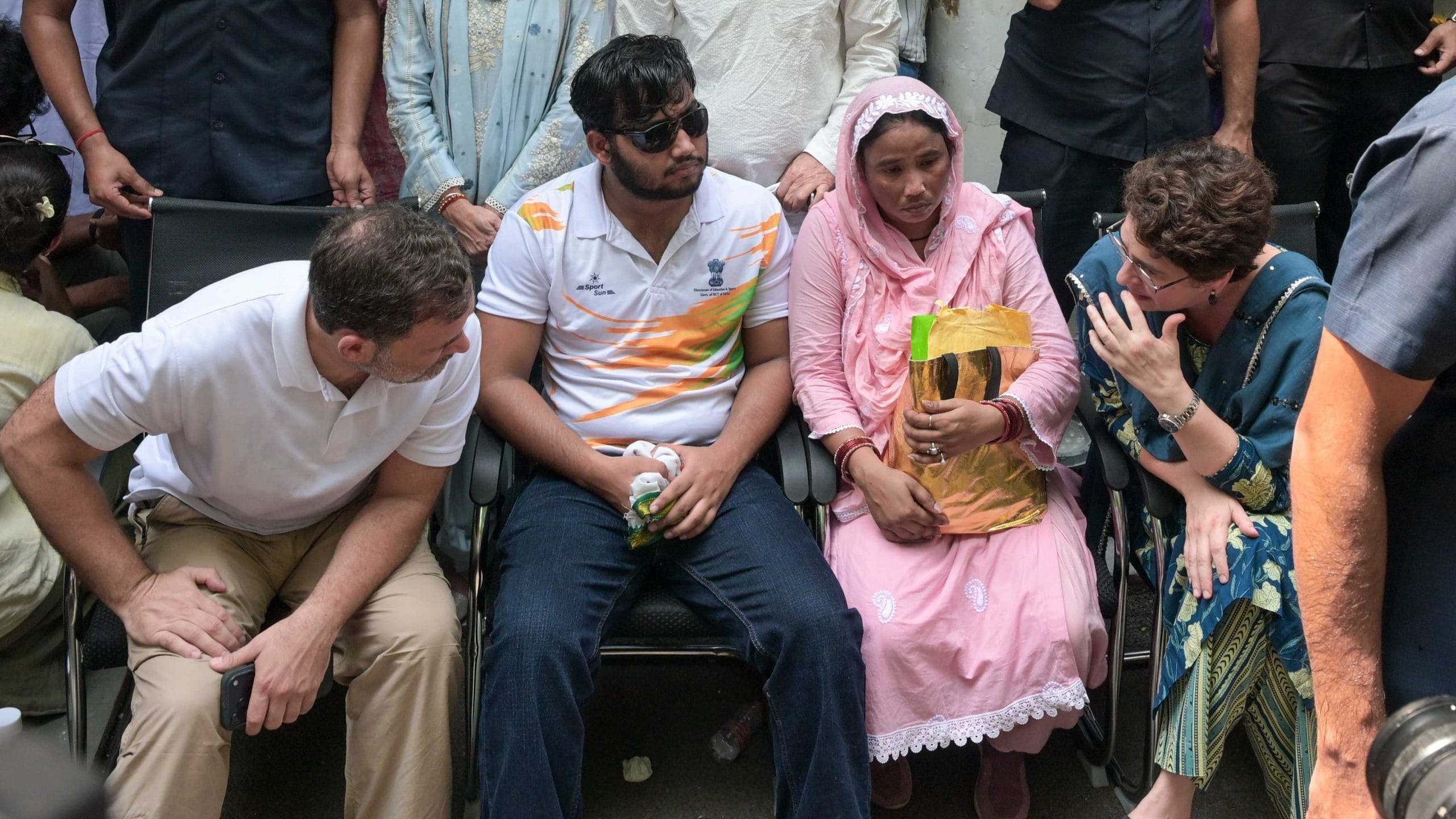 Photos of the Week: RaGa’s dharna, anti-reservation protests in Delhi & NCR’s monkey whisperers