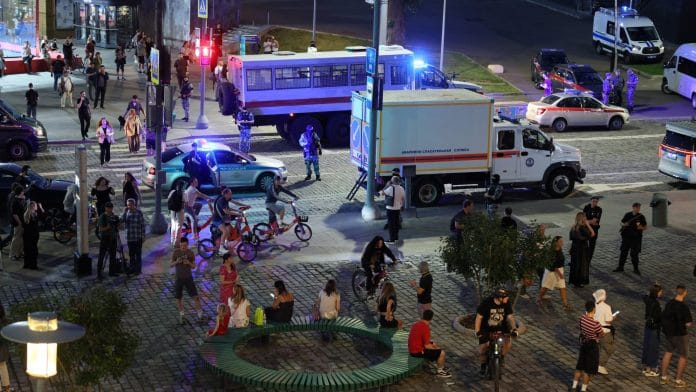 Law enforcement officers and emergency services personnel near the site of an explosion at a restaurant in central Moscow, Russia August 1, 2026. | Anastasia Barashkova / REUTERS