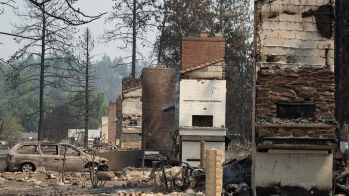 Chimneys from homes lost during the Old Trails fire line near West Houston Avenue in Spokane, Washington | REUTERS/Matt Mills McKnight