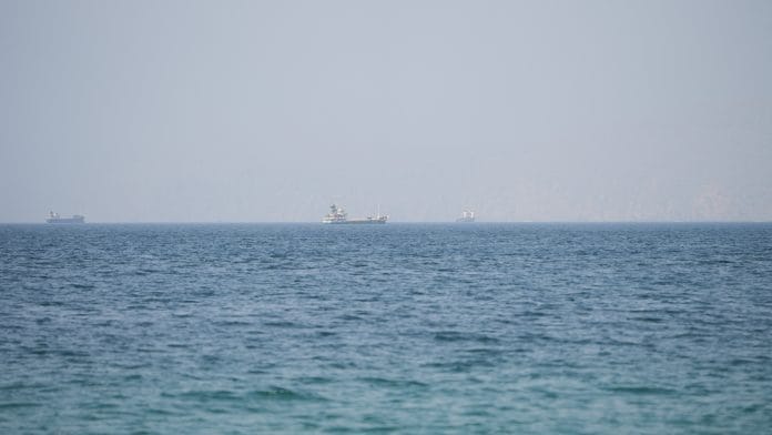 Vessels near the Strait of Hormuz, as seen from Musandam, Oman REUTERS/Stringer