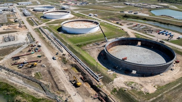 In an aerial view, the Strategic Petroleum Reserve storage at the Bryan Mound site is seen on October 19, 2022 in Freeport, Texas. US President Joe Biden is planning to release fifteen million barrels of oil from the nation's emergency reserves in an effort to continue curving gas prices around the country. The deal completes Biden's March initiative to release 180 million barrels from the Strategic Petroleum Reserve. | Bloomberg