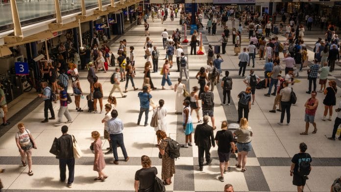 Commuters at Liverpool Street Railway Station during a heat wave in the City of London, UK, on Tuesday, May 26, 2026. The first major heat wave of the season broke temperature records across northwest Europe, triggered water shortages in the UK and has been linked to several deaths in France. | Jose Sarmento Matos/Bloomberg