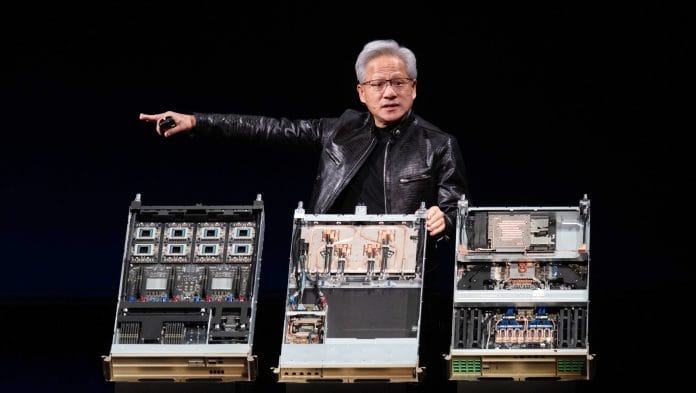 Jensen Huang presents the Vera Rubin data center AI system during Computex 2026 in Taipei. | Bloomberg