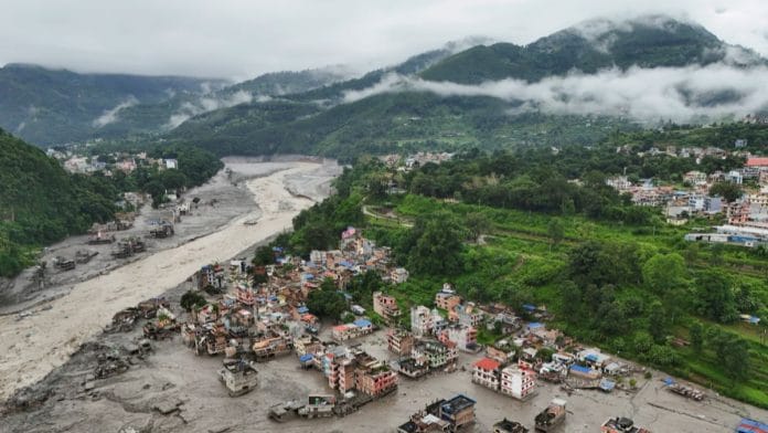 A drone view shows mud covering properties following a flash flood in Trishuli, Nuwakot district, Nepal, on Wednesday | Navesh Chitrakar | REUTERS