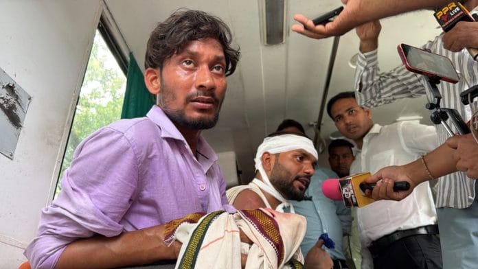 Ishant Singh getting his head wound dressed inside an ambulance. Nootan Sharma | ThePrint