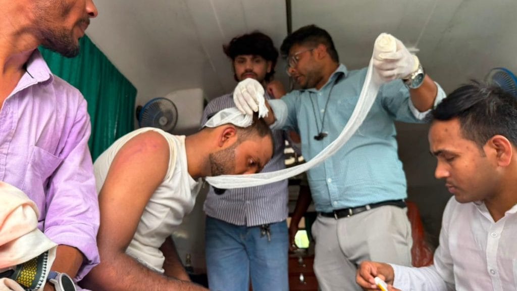 A student getting first aid after getting injured. Nootan Sharma | ThePrint