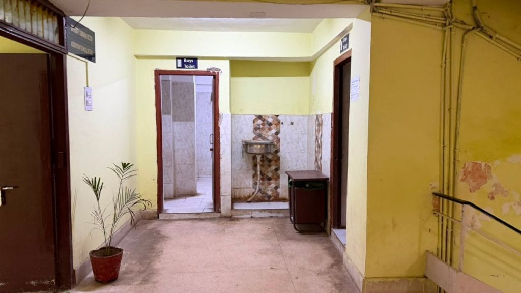 An unmaintained, smelly toilet stands next to the central library at Ranchi University. Nootan Sharma | ThePrint