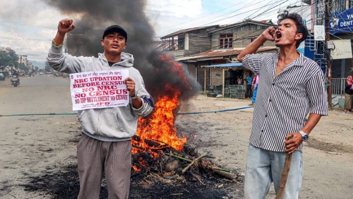 Protesters burn effigies during 48-hour general strike called by Campaign for Just and Fair Delimitation (JFD), demanding NRC updation before Census in Imphal on 19 August, 2026 | ANI