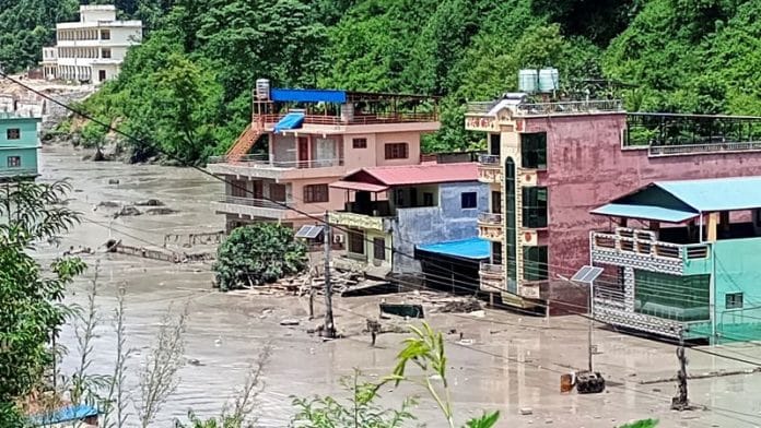 A flooded road following a flash flood in Galchhi in the Dhading district, Nepal, August 26, 2026. Picture taken with a mobile phone. REUTERS/Stringer