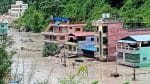 A flooded road following a flash flood in Galchhi in the Dhading district, Nepal, August 26, 2026. Picture taken with a mobile phone. REUTERS/Stringer