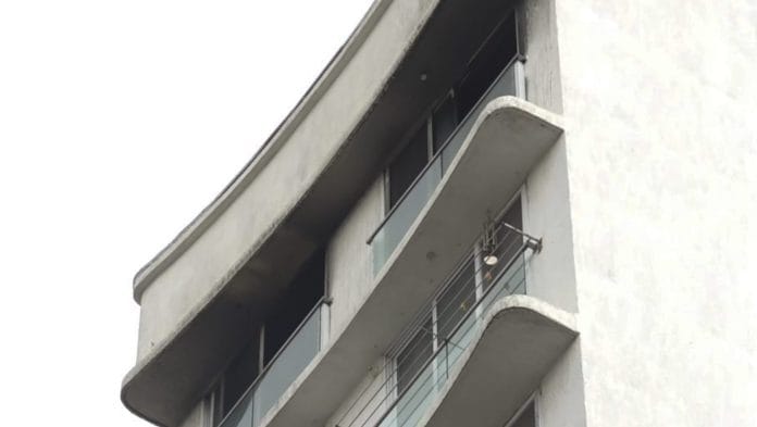 Charred remains of portion of a building after fire broke out in the 12-storey residential building in Mumbai's Vile Parle area. | PTI