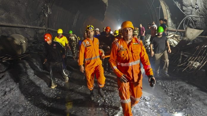 Rescue personnel at site after water and debris entered a tunnel under construction at a hydroelectric project site on Thursday, in Chamoli, Uttarakhand, Friday, Aug. 14, 2026. At least Six people died and 14 sustained injuries.| PTI