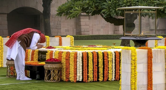 Prime Minister Narendra Modi pays homage at Rajghat during the 8oth Independence Day, in New Delhi. | @narendramodi/PTI