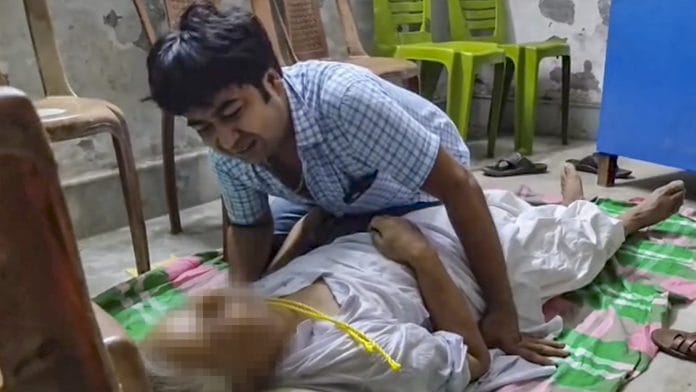 A family member of former deputy speaker of the West Bengal Assembly, Ashis Banerjee, mourns after the latter was found hanging, at a TMC party office in Birbhum district, West Bengal, Sunday, Aug. 16, 2026. A purported suicide note was also recovered from the party office located near his residence in Hattala Para in Rampurhat, according to police. | PTI