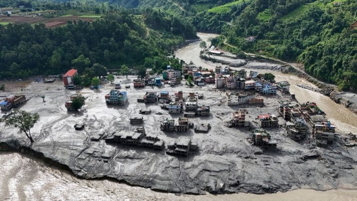 A drone view shows mud covering buildings and property following devastating floods at Trishuli in Nuwakot district, Nepal | Navesh Chitraka | REUTERS