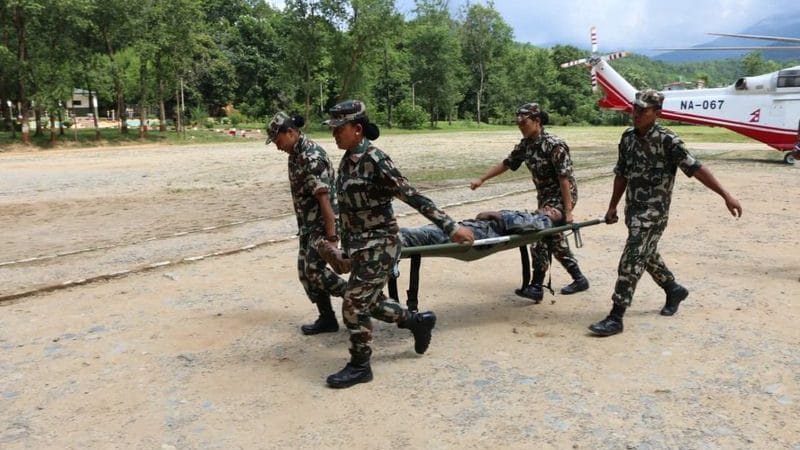 Nepal buries over 150 unidentified bodies of flood victims. DNA samples collected