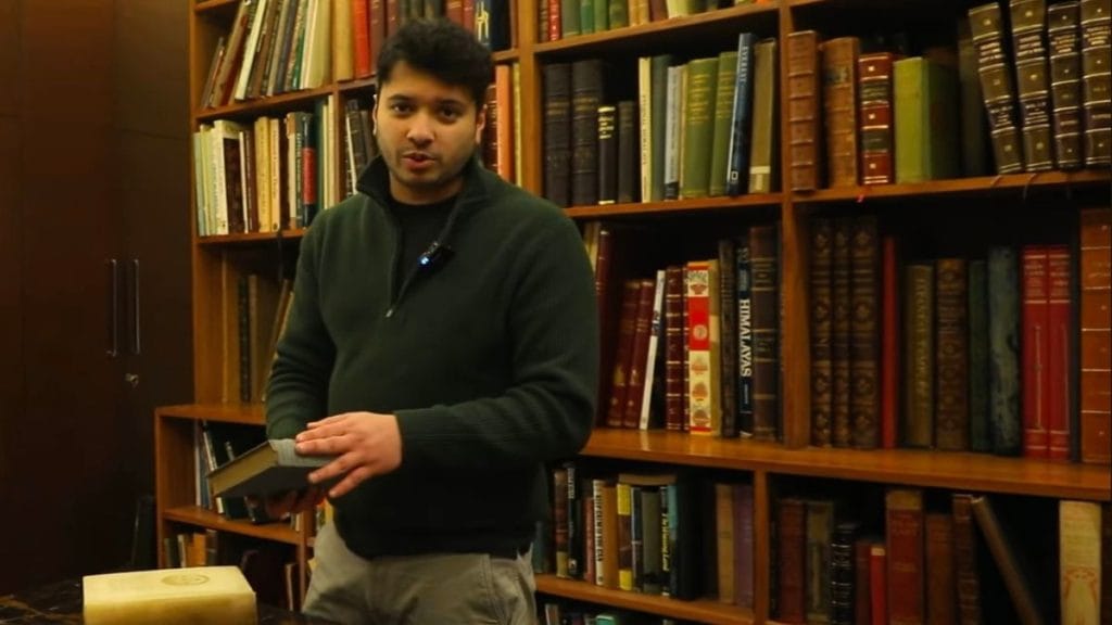 Rishabh Jain, son of Rajiv Jain, shows the military section of the bookstore | Anisha Nehra, ThePrint