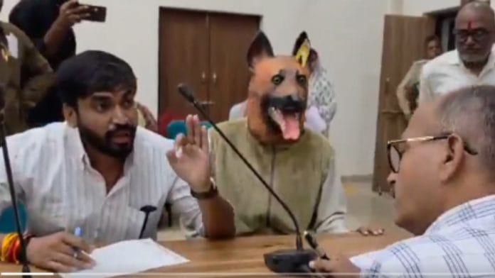 A person arrived at the public hearing in the collectorate wearing a dog costume in protest against the rising terror of stray dogs in the city | X