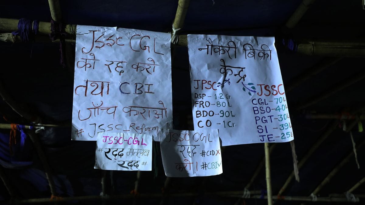 Protest posters calling government job recruitments a business, demanding a CBI investigation | Anisha Nehra, ThePrint