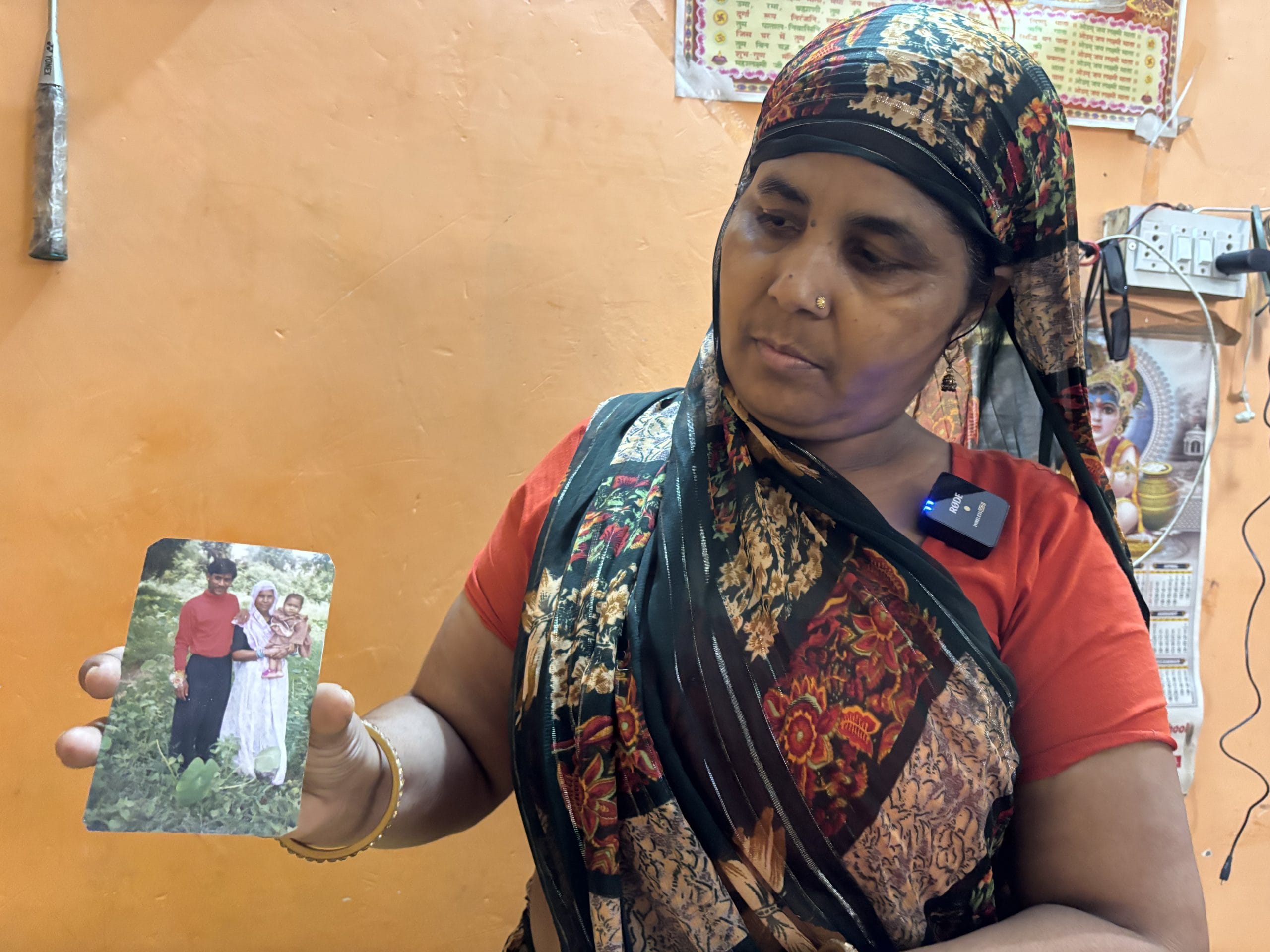 Rajkumari holds the only photograph she has of her husband, Ajit| Vitasta Kaul, ThePrint