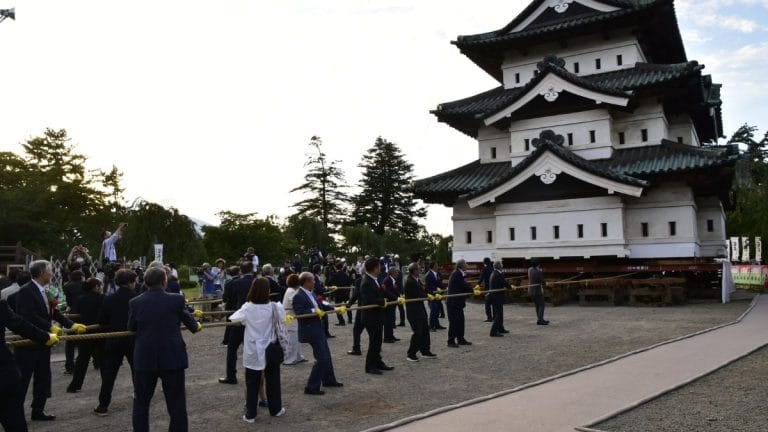 1,800 people pull 360-tonne Japanese castle back into place. They moved it 2 metres
