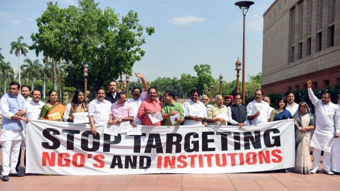 Representational image: Opposition MPs protest in Parliament premises demanding the withdrawal of Foreign Contribution (Regulation) Amendment Bill 2026 during the Budget Session in New Delhi in April | ANI