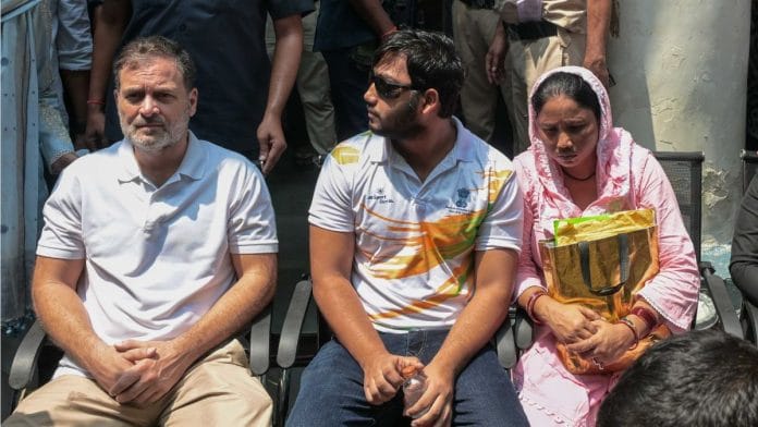 Lok Sabha LoP Rahul Gandhi with Sahil Lochab, who suffered pellet injuries during the student protest march on Parliament Street on 20 July. Sahil's family members and other Congress leaders also present | Suraj Singh Bisht | ThePrint