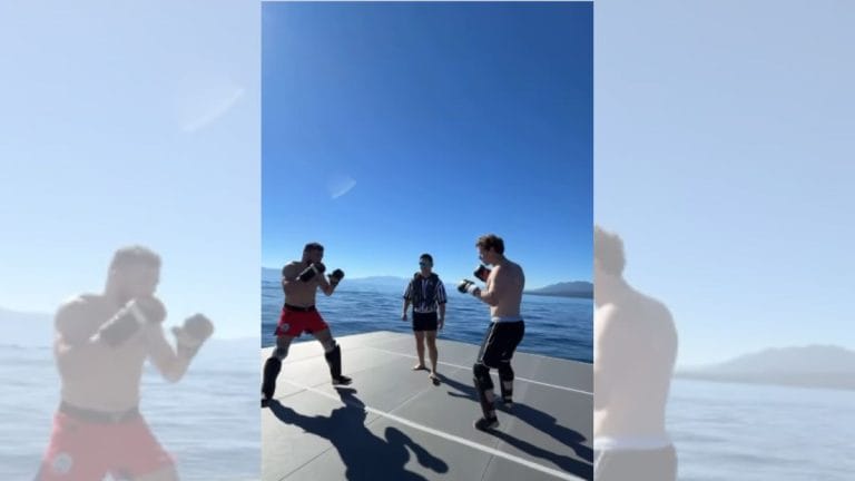 Mark Zuckerberg spars with UFC star Merab Dvalishvili. They throw each other into water