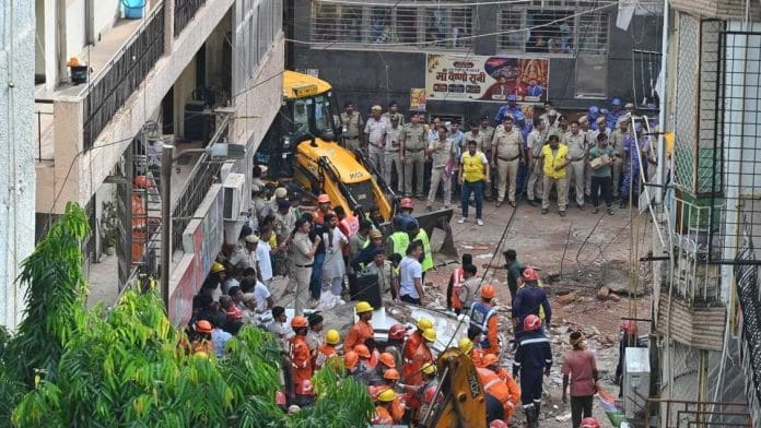 Rescue operations underway as a building collapsed near Satya Niketan in South-West Delhi on Sunday afternoon, with several people feared trapped inside. | Suraj Singh Bisht/ThePrint