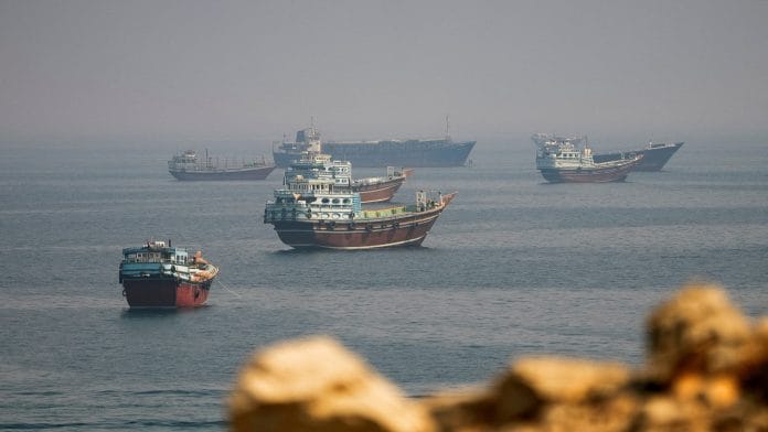 Vessels near the Strait of Hormuz, as seen from Musandam, Oman, August 31, 2026. | REUTERS/Stringer