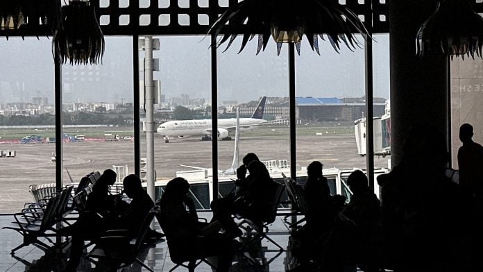 People wait to board their flight at the Chhatrapati Shivaji Maharaj International Airport in Mumbai, India, May 30, 2025. REUTERS/Francis Mascarenhas