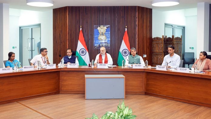 Union Home Minister Amit Shah addresses the launch of the FCRA 2.0 Portal and Electronic Overseas Citizen of India (e-OCI) Card, in New Delhi on Tuesday. Intelligence Bureau (IB) Director Mahesh Dixit present. (@AmitShah X/ANI Photo)