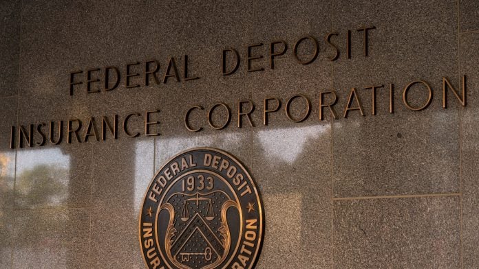 The Federal Deposit Insurance Corp. (FDIC) headquarters in Washington, DC, US, on Monday, May 20, 2024. Earlier this month, the Federal Deposit Insurance Corp., the Office of the Comptroller of the Currency, and the Federal Housing Finance Agency announced that they had taken an initial step toward imposing the long-delayed Dodd-Frank Act rule, which would force banks to claw back some pay from executives taking on too much risk.