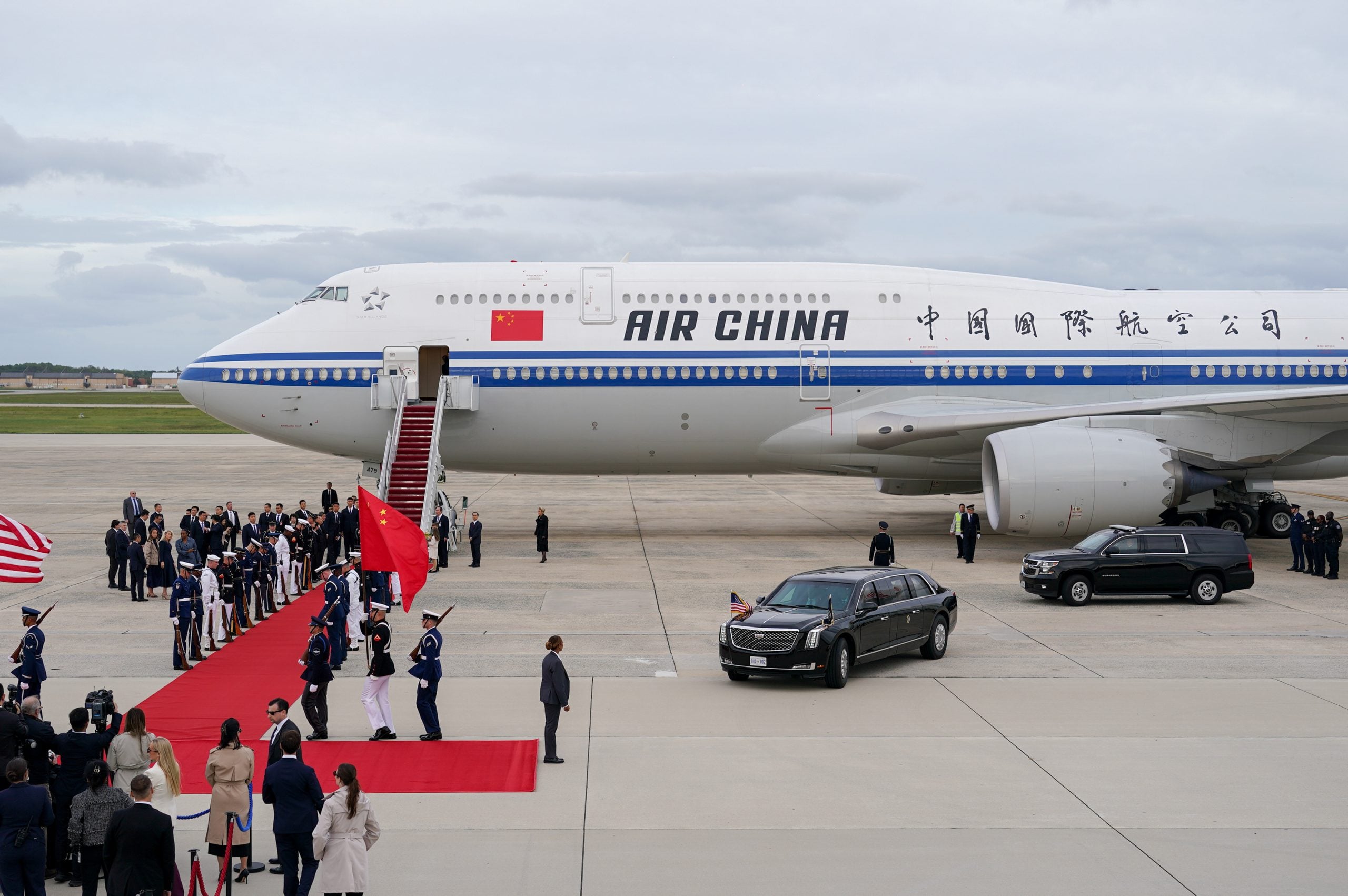 The presidential motorcade, carrying US President Donald Trump, approaches an Air China plane, carrying Chinese President Xi Jinping, during an arrival ceremony at Joint Base Andrews, Maryland, US, on Wednesday, Sept. 23, 2026. Xi Jinping and Donald Trump will sit down this week to hash out a plethora of thorny issues from trade to Taiwan. One thing both sides agree on: neither can afford to tap the brakes on AI. Photographer: Al Drago/Bloomberg