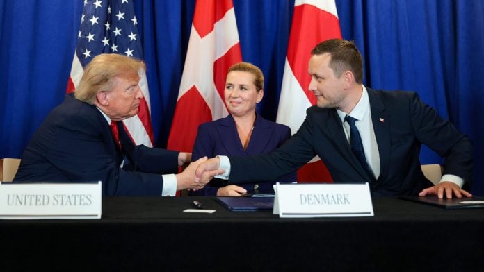 US President Donald Trump, Denmark's Prime Minister Mette Frederiksen and Greenlands Prime Minister Jens-Frederik Nielsen shake hands during the signing of a security pact between the US, Denmark, and Greenland during the UN General Assembly at UN Headquarters in New York, on Sept. 22.