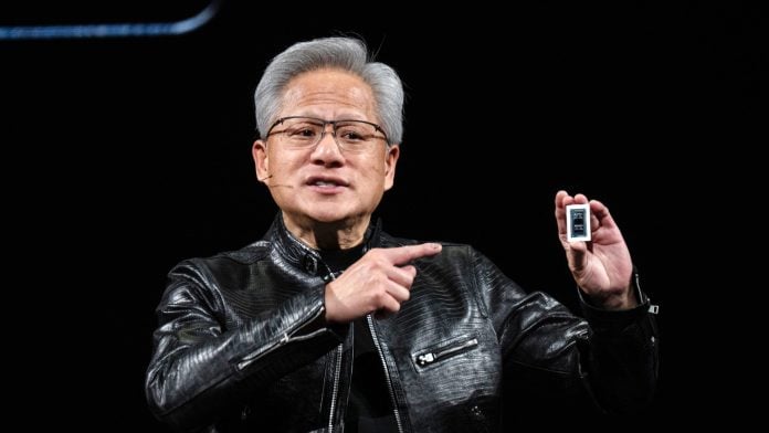 Jensen Huang, chief executive officer of Nvidia Corp., presents the RTX Spark Superchip at the Nvidia GTC event on the sidelines of Computex 2026 in Taipei, Taiwan, on Monday, June 1, 2026. Nvidia is entering the PC market with a new chip aimed at loosening the stranglehold of Intel Corp. technology in that arena and modernizing the machines for the AI era. Photographer: Lam Yik Fei/Bloomberg
