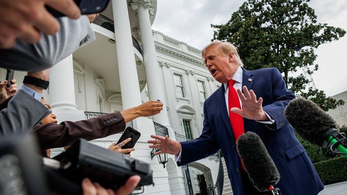 US President Donald Trump speaks to members of the media on the South Lawn of the White House before boarding Marine One in Washington, DC, US, on Saturday, Sept. 26, 2026. Trump said Saturday he rejected a deal from Iran to reopen the Strait of Hormuz as Saudi Arabia's capital came under attack from Yemen's Houthis over the weekend. | Bloomberg