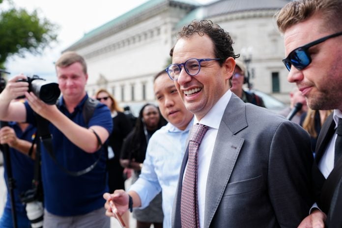 Dario Amodei arrives for a meeting at the White House in Washington on Sept 29. | Bloomberg