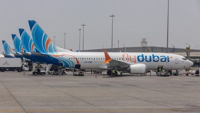 Passenger aircraft operated by FlyDubai. | Photographer: Christopher Pike/Bloomberg