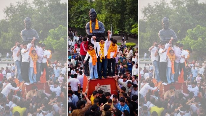 ABVP's winning panel poses in front of a bust of Swami Vivekananda at Delhi University on 19 September 2026 | X/@ABVPDelhi