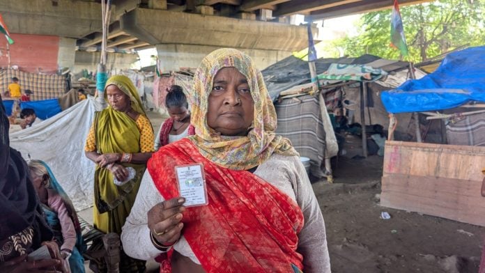 Chandri, 65, who has been marked as “permanently shifted” in the ASDD list, showing her identity document | Apoorva Mandhani/ThePrint
