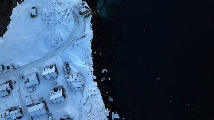 Representational | A drone view shows houses on the shore of Nuuk, Greenland, on 7 February, 2026 | Stoyan Nenov/Reuters