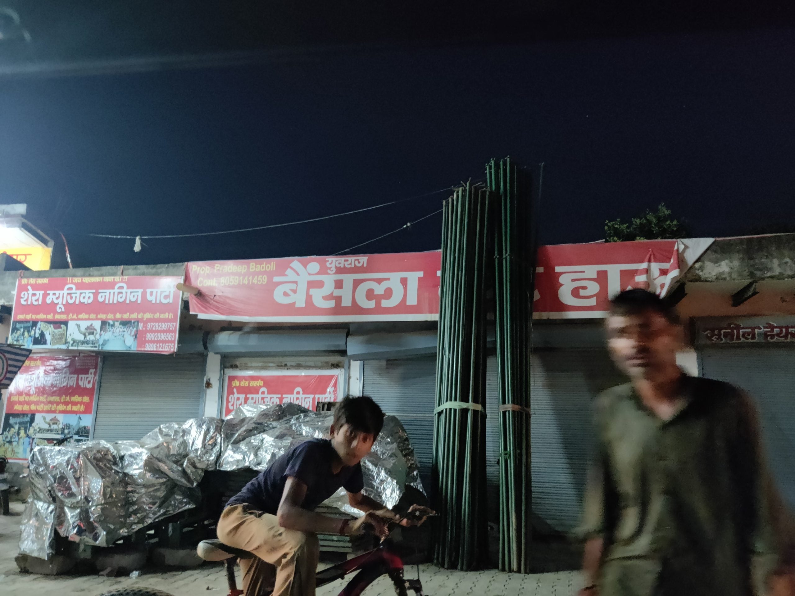 Several shops displaying the Bainsla surname, the dominant caste in n Kalyan Bainsla's Tikri Gurjar village | Almina Khatoon/ThePrint