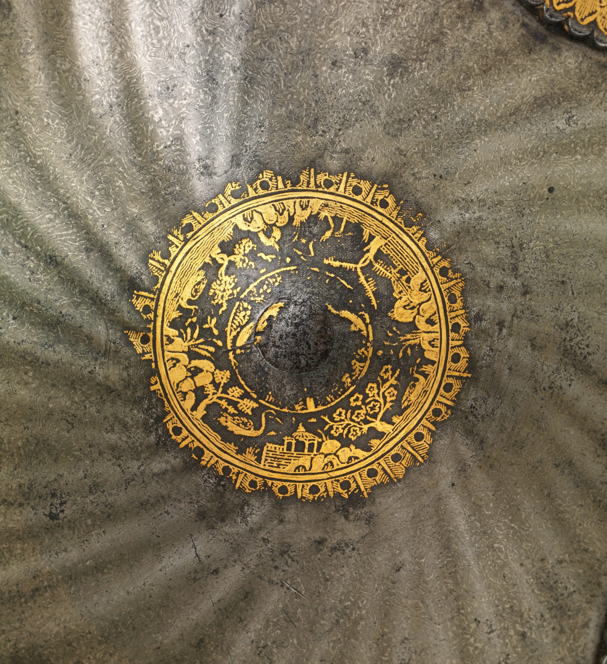 Knob detail, koftgari shield; Probably Mughal, India; Late 17th century; Steel with gold overlay. Courtesy The Metropolitan Museum of Art, New York