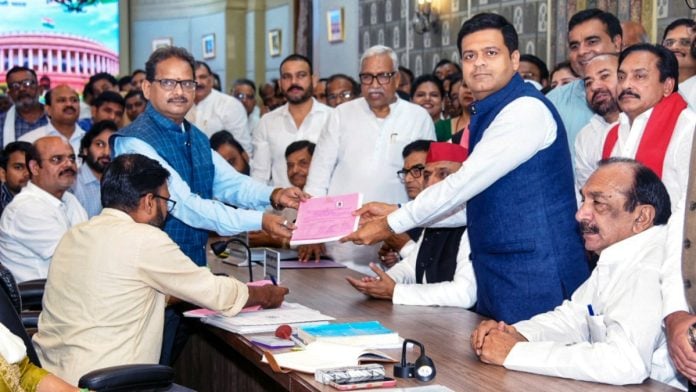 Samajwadi Party candidate for Rajya Sabha elections, Dhanraj Nathwani, files nomination papers in presence of party chief Akhilesh Yadav, in Lucknow on 30 September, 2026 | ANI