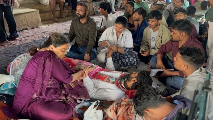 Vijay Ramesh Bamble on Day 15 of hunger strike getting vital checked by on site doctors. Kasturi Walimbe | ThePrint