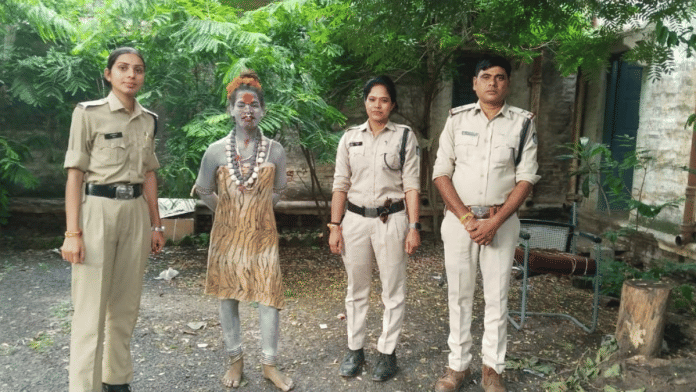 Police personnel with Aghori practitioner 'Kali' after arrest | By special arrangement